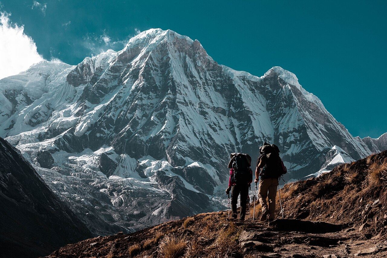 Two trekkers on the trail below Annapurna, Nepal