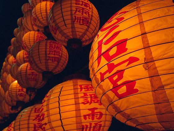Paper lanterns glowing at a lantern festival