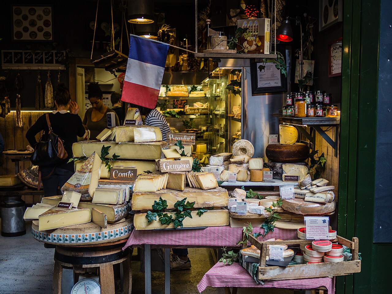 A French cheese stall under the tricolour