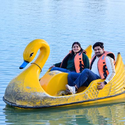 Two of our travellers in a swan boat on the lake at Mount Abu