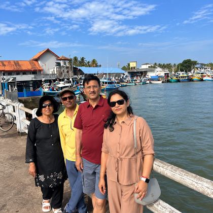 Our travellers by a fishing harbour in Sri Lanka