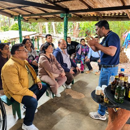 Our travellers listening to a guide at a spice garden in Sri Lanka